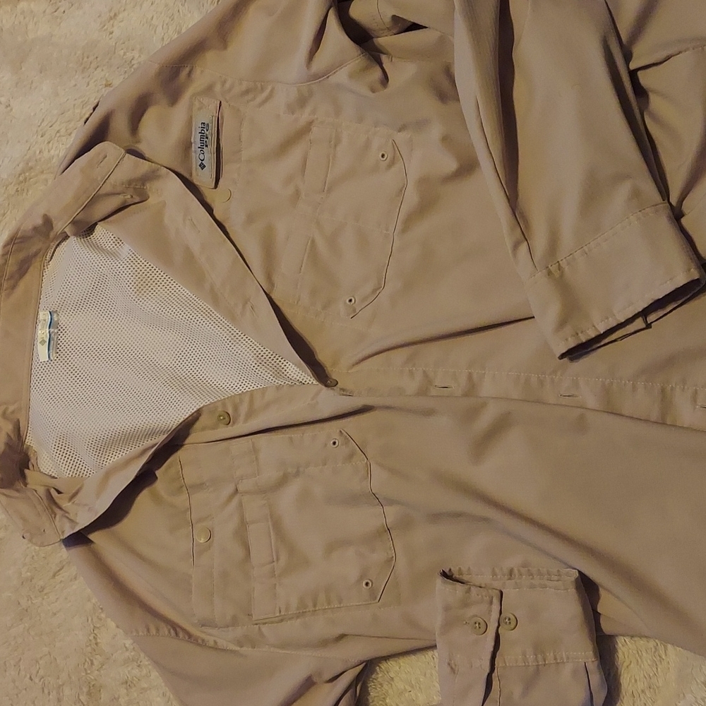 Amazing utility shirt by Columbia. Very light weight. Pockets for days.